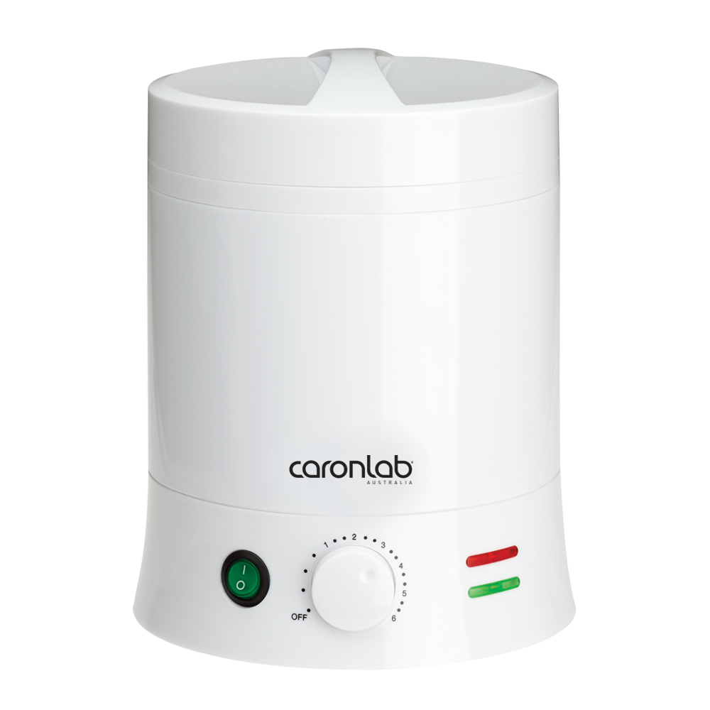 A white Caronlab professional wax heater with a metal insert, temperature control dial, and indicator lights.