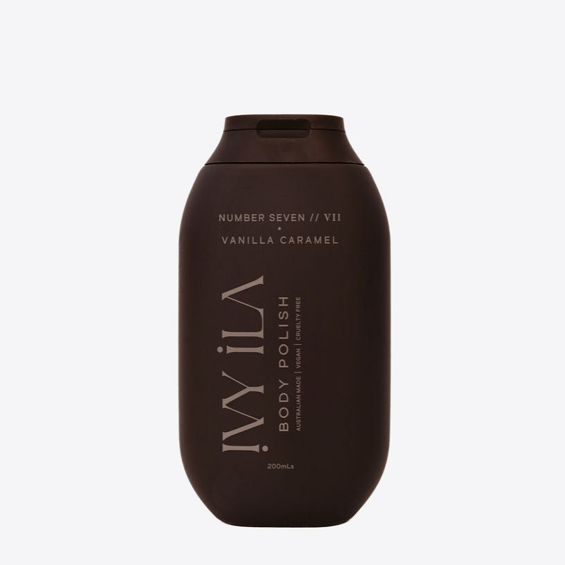 Brown bottle of Vanilla Caramel body polish on a white background