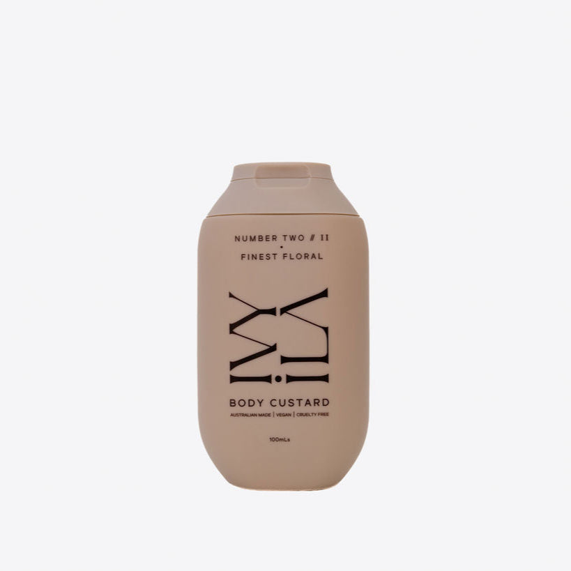Beige bottle of body custard with black text on a white background