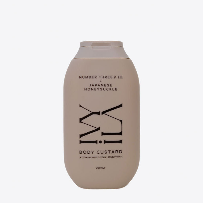 Body custard bottle with branding on a light gray background