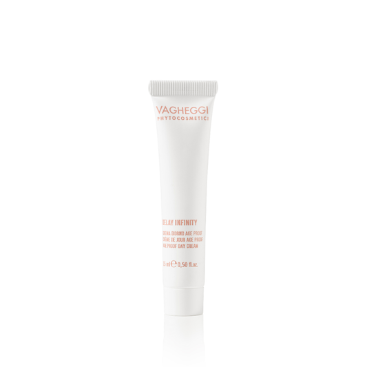 White cosmetic tube with red text on a white background