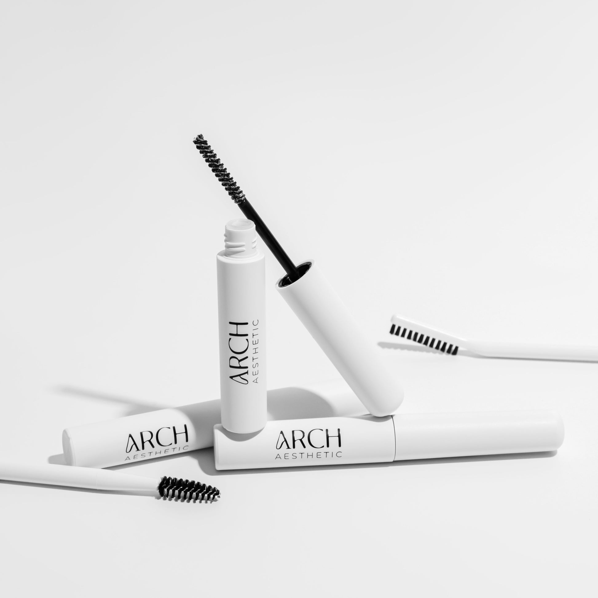 Arch cosmetic products on a white background