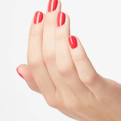 A close-up of a hand with manicured nails painted in a bright red and white diagonal striped pattern, set against a plain white background.