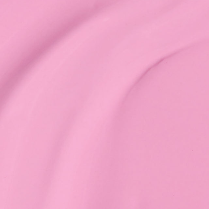 A close-up of a smooth, soft pink material with gentle folds and shading.